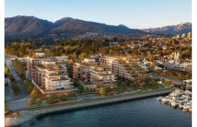 Unfurnished 2BR + den condo with waterfront view and mountain backdrop.