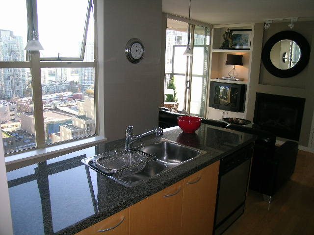 Bright kitchen with granite countertops, hardwood floors, and a city view. - 703 - 1000 Beach Avenue, Vancouver Downtown
