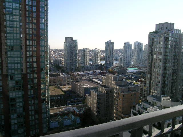 Bright living room with stunning city view and modern furnishings. - 703 - 1000 Beach Avenue, Vancouver Downtown