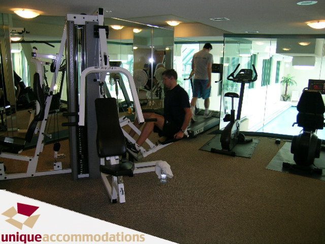 Gym with cardio equipment and mirrors, spacious and well-lit. - 509 - 939  Homer Street, Vancouver Downtown