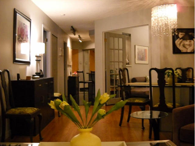 Furnished living room with hardwood floors, modern decor, and a chandelier. - 1402 - 1625 Hornby, Vancouver Downtown
