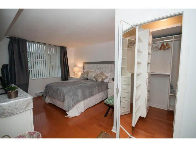Furnished 2-bedroom condo with hardwood floors, white countertops, and a city view. - 407 - 1485 West 6th Ave, Vancouver West Side