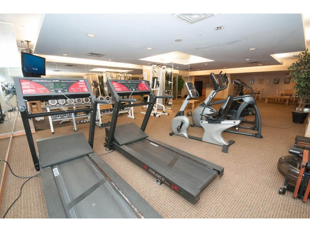 Furnished fitness room with treadmills and exercise equipment. - 407 - 1485 West 6th Ave, Vancouver West Side