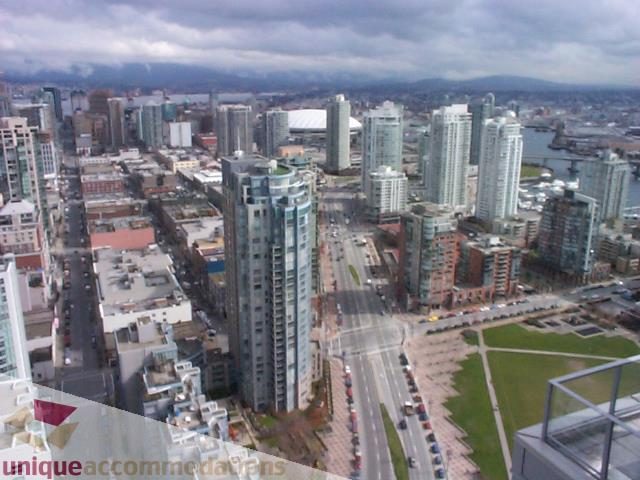 Furnished 2-bedroom + den with stunning city view. - 3101 - 1408 Strathmore Mews, Vancouver Downtown