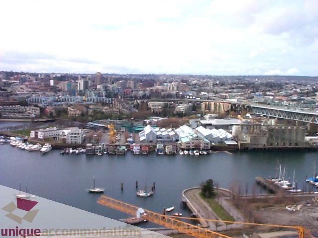 Furnished 2-bedroom + den with stunning city view and waterfront access. - 3101 - 1408 Strathmore Mews, Vancouver Downtown