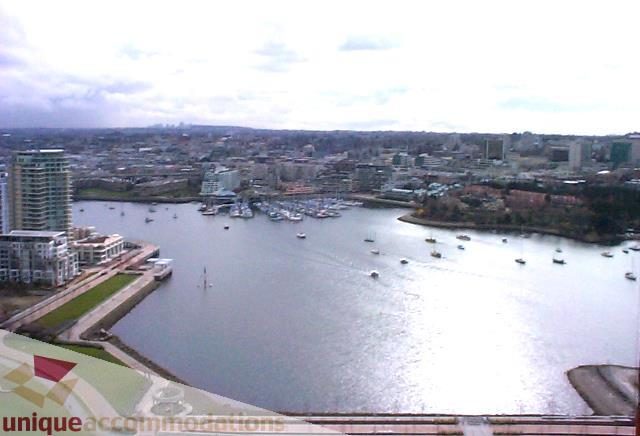 Furnished 2-bedroom + den with stunning city view and waterfront access. - 3101 - 1408 Strathmore Mews, Vancouver Downtown