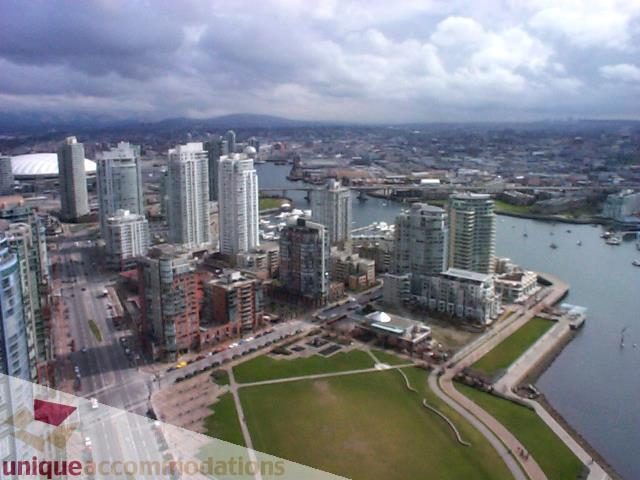 Furnished 2-bedroom + den with stunning city view and waterfront access. - 3101 - 1408 Strathmore Mews, Vancouver Downtown