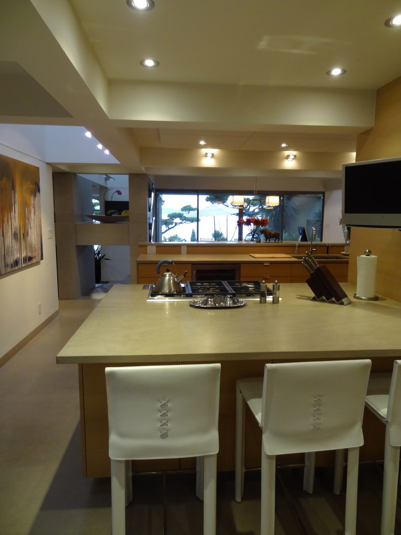Bright kitchen with modern island, hardwood floors, and city view. - 2898 Bellevue Avenue, West Vancouver