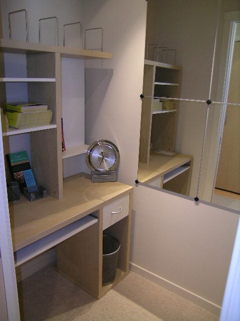 Compact kitchen with light wood cabinets and a small trash bin. - 409 - 969 Richards Street, Vancouver Downtown