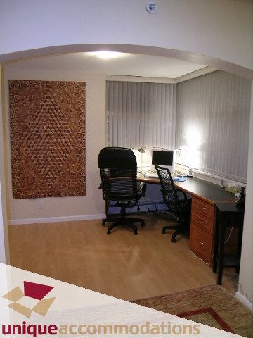 Furnished office with hardwood floors, desk, and chairs. - 322 - 1228 Marinaside Crescent, Vancouver Downtown