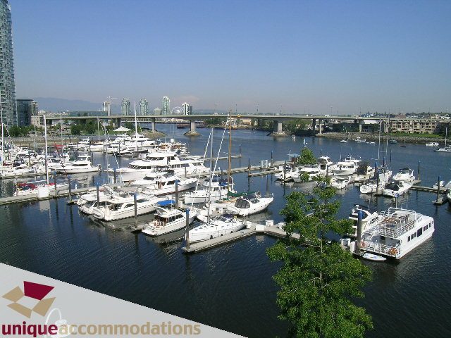 Furnished 2-bedroom + den townhouse with a stunning marina view. - 322 - 1228 Marinaside Crescent, Vancouver Downtown