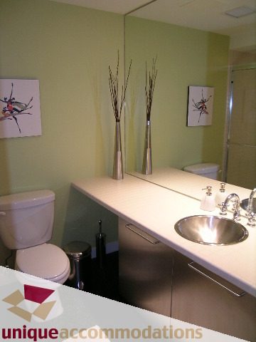 Bright bathroom with white countertops and modern decor. - 409 - 1072 Hamilton Street, Vancouver Downtown