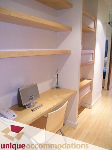 Bright loft with wooden shelves and desk, hardwood floors. - 409 - 1072 Hamilton Street, Vancouver Downtown
