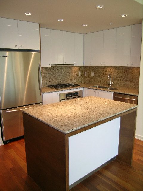 Bright kitchen with granite countertops, stainless steel appliances, and hardwood floors. - 505 - 1005 Beach Avenue, Vancouver Downtown