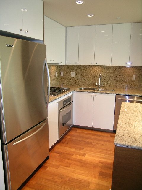 Bright kitchen with granite countertops, stainless steel appliances, and hardwood floors. - 505 - 1005 Beach Avenue, Vancouver Downtown