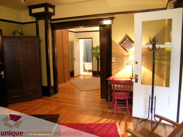 Furnished living room with hardwood floors and a cozy corner nook. - 3 - 2812 Yukon, Vancouver West Side