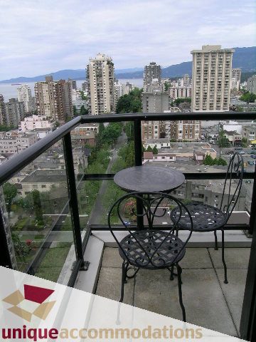 Furnished balcony with city view and patio furniture. - 1807 - 1003 Burnaby Street, Vancouver Downtown