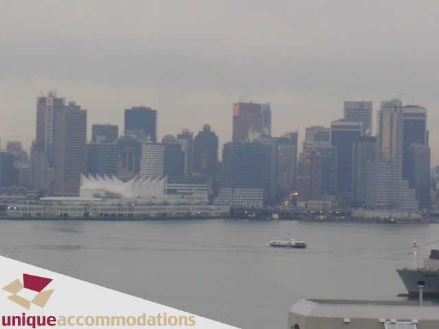 Bright living room with stunning city view and waterfront access. - 1404 - 155 W. 1st Street, North Vancouver