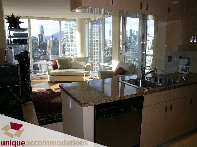 Bright kitchen with granite countertops and city view. - 3101 - 1033 Marinaside Crescent, Vancouver Downtown