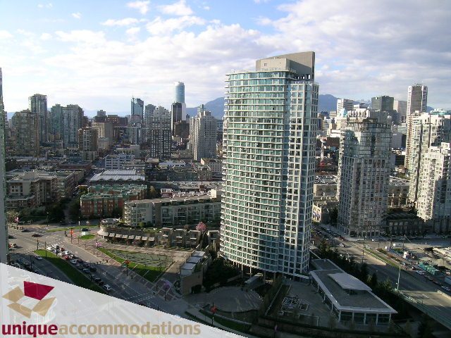 Furnished 1-bedroom + den with stunning city view and modern furnishings. - 3101 - 1033 Marinaside Crescent, Vancouver Downtown