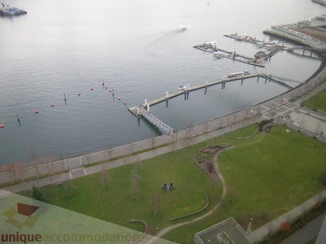 Bright living room with city view and waterfront access. - 2101 - 1281 West Cordova Street, Vancouver Downtown
