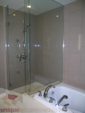 Bright bathroom with glass shower and modern fixtures. - 2101 - 1281 West Cordova Street, Vancouver Downtown