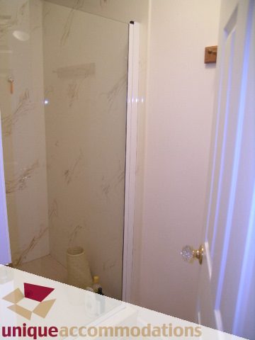 Bathroom with marble shower and door handle. - 1416 Chartwell Drive, West Vancouver