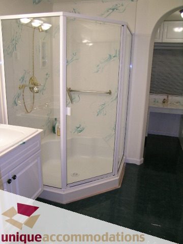 Furnished bathroom with glass shower and modern fixtures. - 1416 Chartwell Drive, West Vancouver