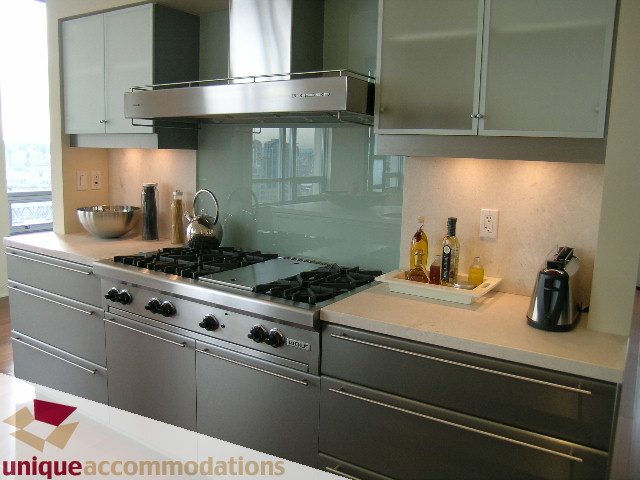 Bright kitchen with stainless steel appliances, modern cabinetry, and a city view. - 2901 - 1005 Beach Avenue, Vancouver Downtown