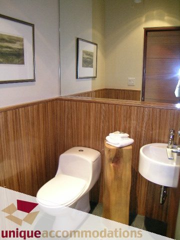 Bathroom with wooden paneling and modern fixtures. - 2901 - 1005 Beach Avenue, Vancouver Downtown