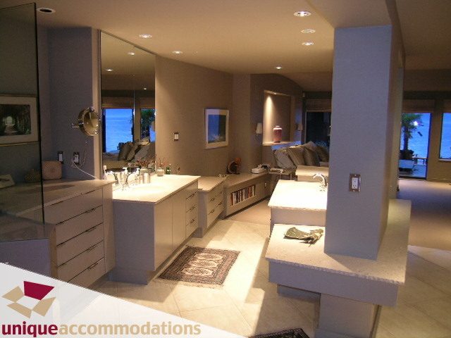 Bright kitchen with modern white countertops, city view, and sleek design. - 2 Strachan Point Road, West Vancouver