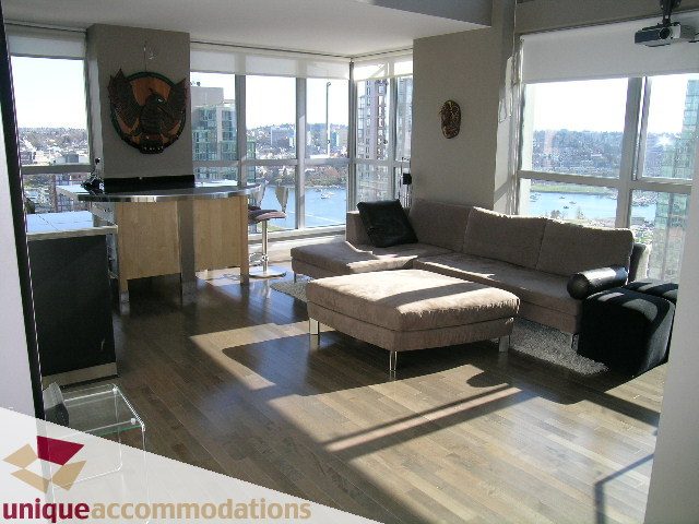 Furnished loft with hardwood floors, city view, and modern decor. - 2001 - 1238 Richards Street, Vancouver Downtown