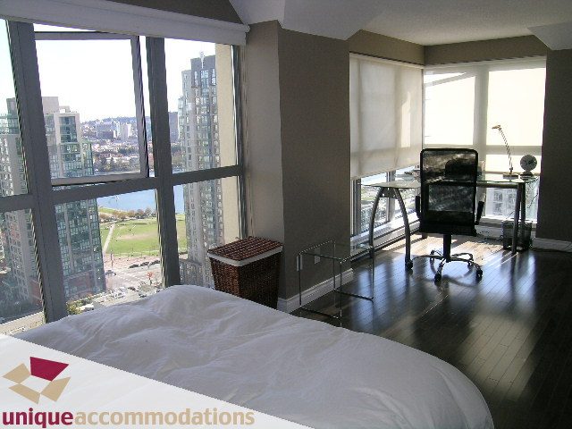 Bright loft with city view, hardwood floors, and a comfortable bed. - 2001 - 1238 Richards Street, Vancouver Downtown