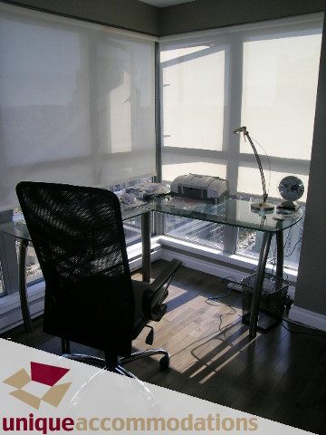 Bright loft with glass countertops, hardwood floors, and city view. - 2001 - 1238 Richards Street, Vancouver Downtown