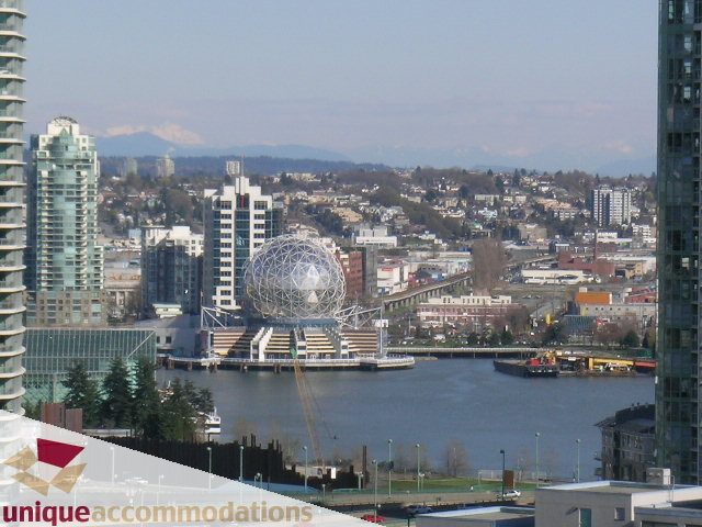 Loft with stunning city view, modern furnishings, and panoramic windows. - 2001 - 1238 Richards Street, Vancouver Downtown
