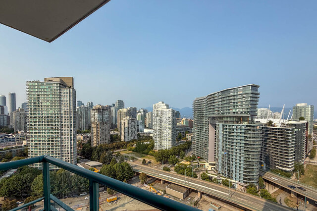 Bright balcony with stunning city view and modern high-rise buildings. - 2602 - 1033 Marinaside Crescent, Vancouver Downtown