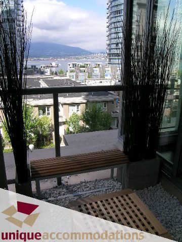 Furnished balcony with city view and modern furnishings. - 302 - 1228 West Hastings Street, Vancouver Downtown