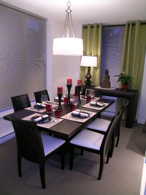 Furnished dining area with modern decor, green curtains, and a chandelier. - 930 Beatty Street, Vancouver Downtown