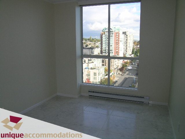 Bright living room with city view and large windows. - PH1 - 125 West 2nd Street, North Vancouver