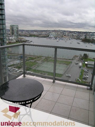 Furnished balcony with city view and waterfront access. - 1805 - 428 Beach Crescent, Vancouver Downtown
