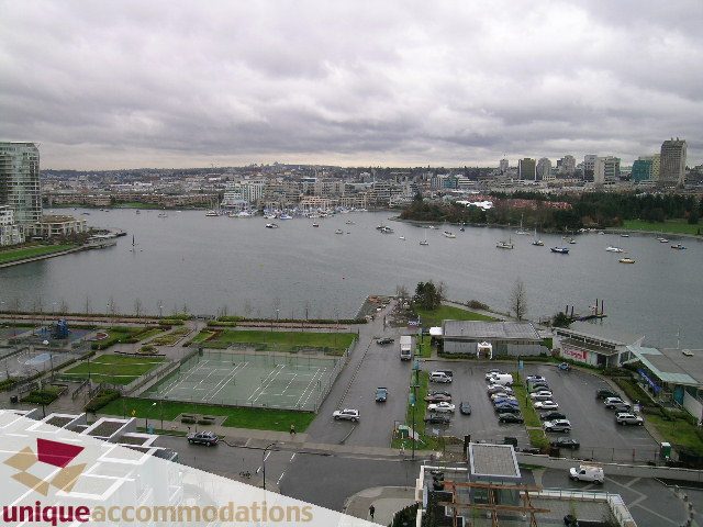Bright living room with city view and waterfront access. - 1805 - 428 Beach Crescent, Vancouver Downtown