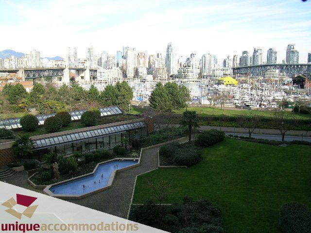 Furnished 1-bedroom with a stunning city view and lush garden. - 407 - 1490 Pennyfarthing Drive, Vancouver West Side