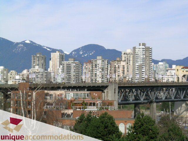 Furnished 1-bedroom condo with stunning city view and modern amenities. - 407 - 1490 Pennyfarthing Drive, Vancouver West Side