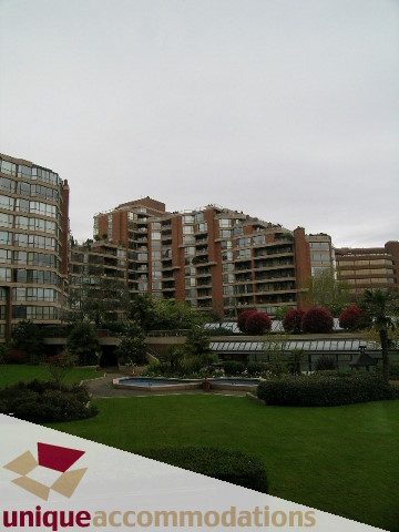 Furnished 1-bedroom + den condo with lush greenery and modern architecture. - 105 - 1490 Pennyfarthing, Vancouver West Side