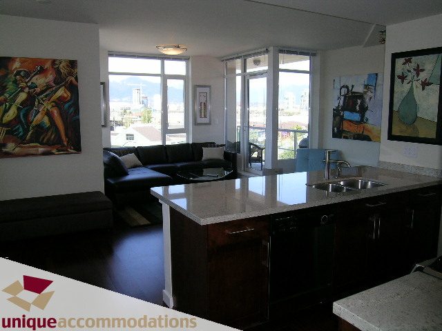 Bright kitchen with granite countertops and city view. - 411 - 2055 Yukon Street, Vancouver West Side