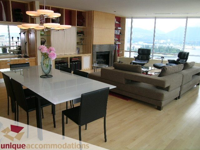 Spacious living room with hardwood floors, modern furniture, and a city view. - 2401 - 1077 W. Cordova Street, Vancouver Downtown