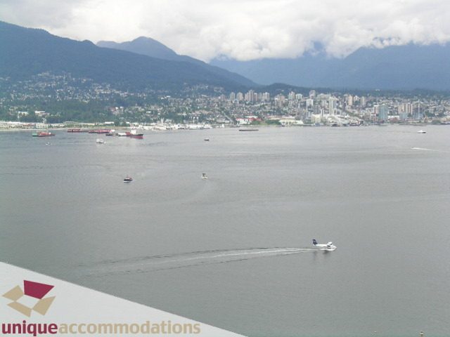 Panoramic view from a 2-bedroom condo with a stunning cityscape and waterfront access. - 2401 - 1077 W. Cordova Street, Vancouver Downtown