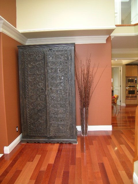 Furnished living room with ornate armoire and hardwood floors. - 1233 11th Street, West Vancouver