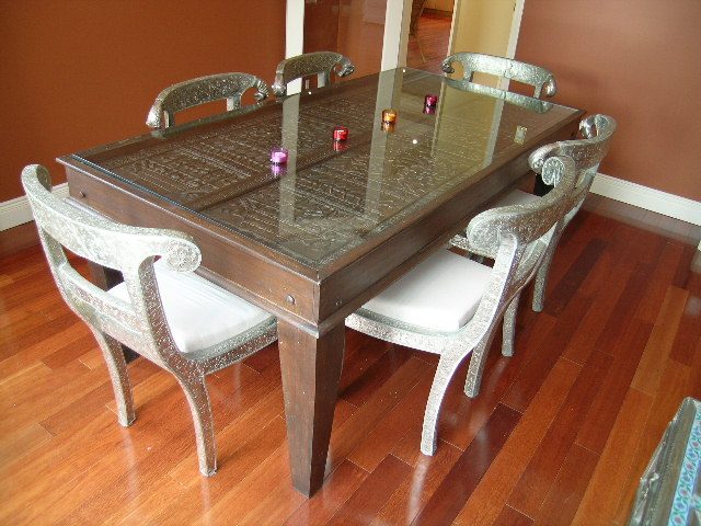 Furnished dining area with ornate chairs and glass table on hardwood floors. - 1233 11th Street, West Vancouver