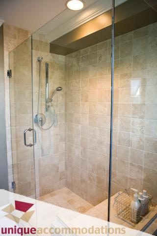 Spacious bathroom with walk-in shower and modern fixtures. - 2555 W 2nd Avenue, Vancouver West Side